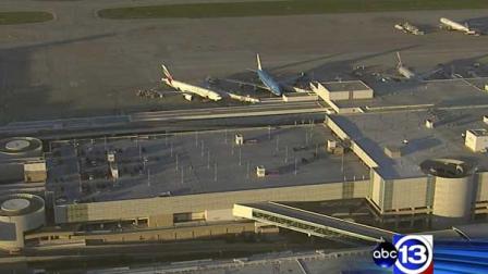 Customs and Border Patrol computers down, causing long lines for international arrivals at Bush Airports Terminal E