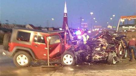 This photo was submitted through our iWitness reports. Two people in the mangled car pictured here on the right died at the scene. Police say the red Jeep was going the wrong way down the highway.