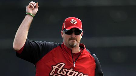 Brett Myers works on his fielding during spring training baseball, Wednesday, Feb. 22, 2012, in Kissimmee, Fla. (AP Photo/Julio Cortez)