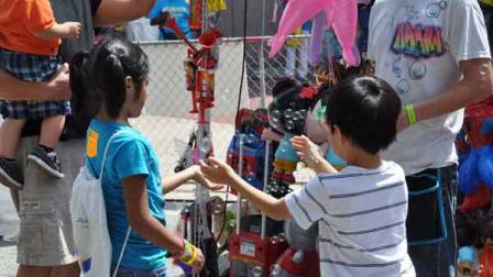 Kids play with bubbles at the Houston Childrens Festival on Saturday