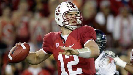 This Nov. 12, 2011 file photo shows Stanford quarterback Andrew Luck (12) passing against Oregon in the first quarter of an NCAA college football game in Stanford, Calif. (AP Photo/Paul Sakuma, File)