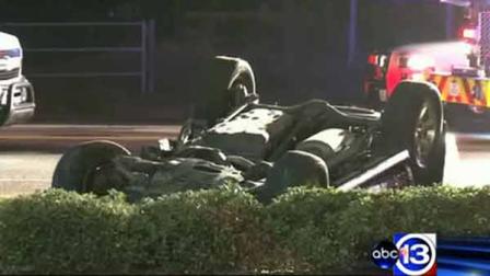 Police say the driver of this flipped SUV died in the crash. Another driver was taken to the hospital