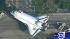 Residents watch as 'Explorer' makes its way... ::