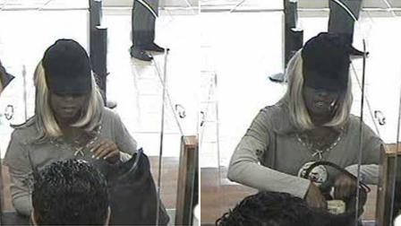 Detectives need help identifying the suspect who robbed a bank in west Houston Tuesday evening. Even though the suspect is dressed like a woman, many witnesses believe it is a man.