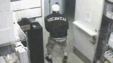 On December 30, 2011, the suspects image was captured by surveillance cameras during a burglary at the cellular store located near the 20100 block of I-45.
