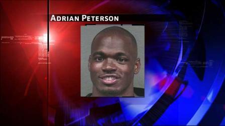 Houston police released Adrian Petersons booking photo Monday morning