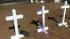 A man who left crosses at the Columbine shooting site returned to Colorado with 12 crosses for each of the shooting victims