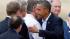 President Barack Obama greets Colorado Gov. John...