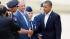 President Barack Obama talks with Aurora, Colo.,...