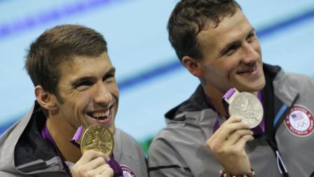 United States Michael Phelps, left, and United States Ryan Lochte pose with their medals for the mens 200-meter individual medley swimming final at the Aquatics Centre in the Olympic Park during the 2012 Summer Olympics in London, Thursday, Aug. 2, 2012. Phelps won gold, Lochte silver. (AP Photo/Michael Sohn)