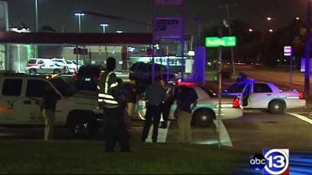 Police at the scene of the end of a chase on Bellaire Blvd.