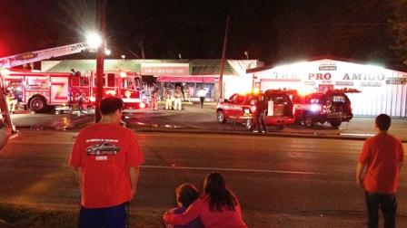 The flames broke out at Joes Food Store around 5am.