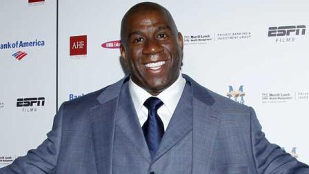 NBA all-star Magic Johnson is leading a group of investors in buying the Houston Pavilions downtown. (AP photo)