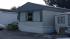 Father allegedly stabs baby to death; 2... :: Windows were smashed out of this mobile home when neighbors heard children screaming inside