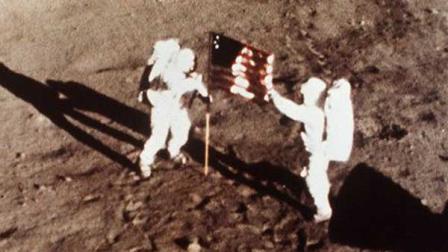 In this July 20, 1969 file photo provided by NASA shows Apollo 11 astronauts Neil Armstrong and Edwin E. Buzz Aldrin, the first men to land on the moon, plant the U.S. flag on the lunar surface. The family of Neil Armstrong, the first man to walk on the moon, says he has died at age 82. A statement from the family says he died following complications resulting from cardiovascular procedures. It doesnt say where he died. Armstrong commanded the Apollo 11 spacecraft that landed on the moon July 20, 1969. He radioed back to Earth the historic news of one giant leap for mankind. Armstrong and fellow astronaut Edwin Buzz Aldrin spent nearly three hours walking on the moon, collecting samples, conducting experiments and taking photographs. In all, 12 Americans walked on the moon from 1969 to 1972. (AP Photo/ Anonymous)