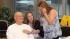 Shannon Lenox listens for the first time to her...