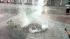 Manhole cover with water coming out in New...