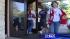 Red Cross volunteers wait for disaster area... ::