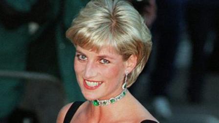 **FILE** Diana, Princess of Wales, smiles as she arrives at the Tate Gallery in London in this Tuesday July 1, 1997 file photo. A three-year inquiry into the death of Princess Diana and Dodi Fayed has concluded that allegations of murder were unfounded, and that there is no reason for suspecting the involvement of the royal family, a senior police officer said Thursday, Dec. 14, 2006. Our conclusion is that, on all the evidence available at this time, there was no conspiracy to murder any of the occupants of the car. This was a tragic accident, said Lord John Stevens, former chief of the Metropolitan Police, who led the investigation of the deaths of Diana, 36, and her companion Dodi Fayed, 42. They were killed along with chauffeur Henri Paul when their Mercedes crashed in the Pont dAlma tunnel in Paris on Aug. 31, 1997, while the couple was being chased by media photographers. (AP Photo/Jacqueline Arzt)