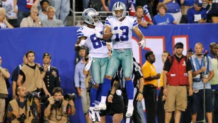 Dallas Cowboys Kevin Ogletree, left, and Dallas Cowboys Miles Austin celebrate Ogletrees touchdown during the first half of an NFL football game Wednesday, Sept. 5, 2012, in East Rutherford, N.J. (AP Photo/Bill Kostroun)
