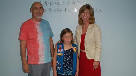 (From left to right) Anthony Victorino, Jr., Maggie Miksch and Mary Vitek, CEO for Girl Scouts of San Jacinto Council. Maggie, age 7, received the Girl Scout Medal of Honor for saving the life of her grandfather Anthony. Lifesaving Awards recognize Girl Scouts from 5-17 years of age who have heroically saved or attempted to save a life. Maggie is only one of 13 girls in the nation to receive this prestigious award this year.