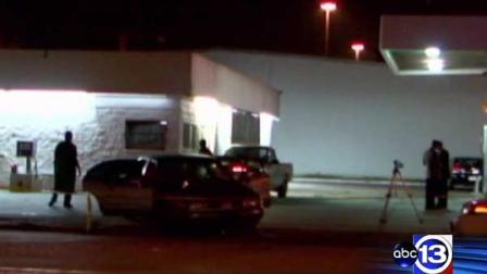 Houston police investigate at the scene of an officer-involved shooting outside a convenience store