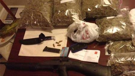 While trying to serve an arrest warrant in northwest Harris County on Thursday, deputies discovered approximately 7 pounds of marijuana, 3.2 pounds of cocaine, 1.5 grams of methamphetamine, an assault rifle and various scales.