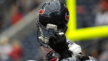 A Houston Texans helmet during a huddle before an NFL football game against the Tennessee Titans Sunday, Sept. 30, 2012, in Houston. (AP Photo/Dave Einsel)