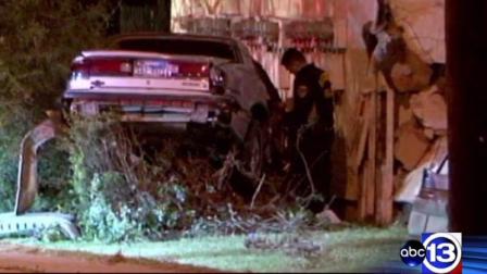 Police say an out-of-control car crashed into an apartment and destroyed part of the building.