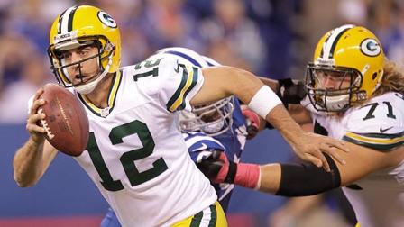 Green Bay Packers quarterback Aaron Rodgers (12) runs during the second half of an NFL football game against the Indianapolis Colts in Indianapolis, Sunday, Oct. 7, 2012. (AP Photo/Michael Conroy)