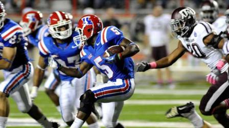 Louisiana Techs D. J. Banks (5) scrambles for yards during an NCAA college football game against Texas A&M in Shreveport, La., Saturday, Oct. 13, 2012. (AP Photo/Kita K Wright)