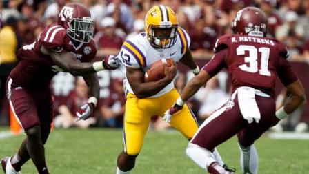 LSU safety Corey Thompson (12) runs between Texas A&M linebacker Steven Jenkins (45) and defensive back Howard Matthews (31) during the second half of an NCAA college football game on Saturday, Oct. 20, 2012, in College Station, Texas. LSU won 24-19. (AP Photo/Eric Kayne)