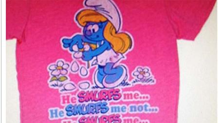 The shirt the victim was wearing was green in color with the design shown on the pink shirt in the photo