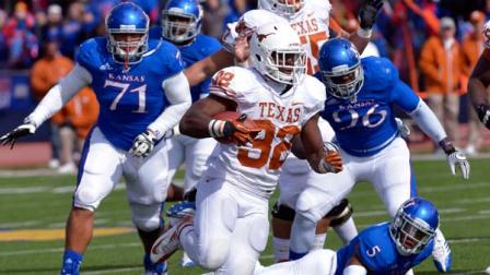Texas running back Johnathan Gray (32) runs against Kansas during an NCAA college football game in Lawrence, Kan., Saturday, Oct. 27, 2012. (AP Photo/Reed Hoffmann)
