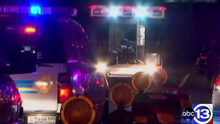 Investigators at the scene of a fatal auto-pedestrian accident involving multiple vehicles on Highway 249