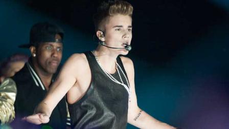 Singer Justin Bieber performs during the CFLs 100th Grey Cup Championship Halftime Show at the Rogers Centre on Sunday, Nov. 25, 2012, in Toronto. (Photo by Arthur Mola/Invision/AP)
