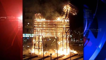 The Christmas Goat in Gavle town on fire Dec. 23, 2001. For 40 years, vandals in the city of Gavle have made it a tradition to burn down the giant straw Christmas goat erected by merchants on a central square. (AP Photo/Andreas Bardell)