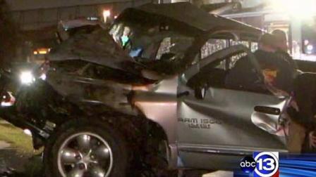 Officials say this pickup slammed into a pole and then caught fire in east Houston