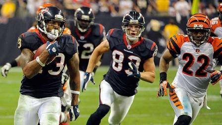 Houston Texans running back Arian Foster (23) runs for a touchdown against the Cincinnati Bengals during the fourth quarter of an NFL wild card playoff football game Saturday, Jan. 7, 2012, in Houston. (AP Photo/Dave Einsel)