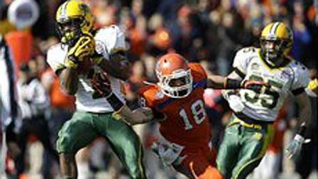 North Dakota State cornerback Marcus Williams (1) intercepts a pass intended for SamHouston States Trey Diller (18) during the first half of the FCS Championship NCAA college football game, Saturday, Jan. 5, 2013, in Frisco, Texas. NDSUs Christian Dudzik (35) watches on the play. (AP Photo/Tony Gutierrez)