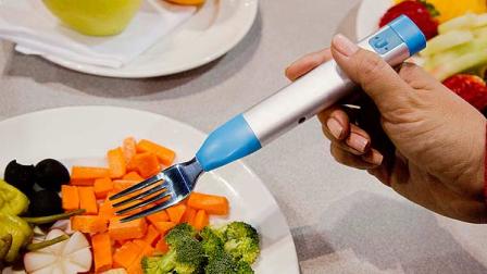 The HAPIfork, made by HAPILABS, smart electronic fork is seen on display at the Consumer Electronics Show, Tuesday, Jan. 8, 2013, in Las Vegas. The fork vibrates and lights up to help its user slow down to a healthy eating pace. (AP Photo/Julie Jacobson)