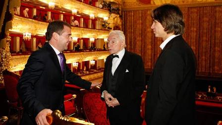 In this Friday, Nov. 18, 2011 photo, then, Russian President Dmitry Medvedev, left, speaks with choreographer Yuri Grigorovich, center, and Bolshoi ballet art director Sergei Filin as he attends the premiere of Sleeping Beauty in the Bolshoi Theater in Moscow, Russia. Filin was attacked Thursday night, Jan. 17, 2013, by an unknown person who splashed acid onto his face. (AP Photo/RIA Novosti, Dmitry Astakhov, Presidential Press Service)