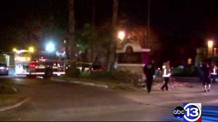 Police say a man passed out at the entrance to this apartment complex and was fatally struck by a car