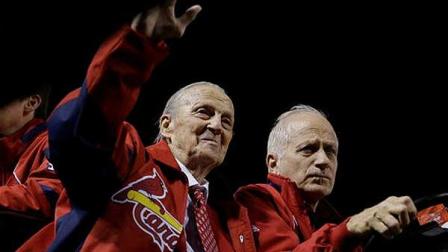 Hall of Famer Stan Musial wave as he drives around Busch Stadium before Game 4 of baseballs National League championship series between the San Francisco Giants and the St. Louis Cardinals Thursday, Oct. 18, 2012, in St. Louis. (AP Photo/Jeff Roberson)