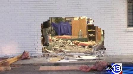 A pastor is in the hospital after a car crashed through the wall of her church and into her.