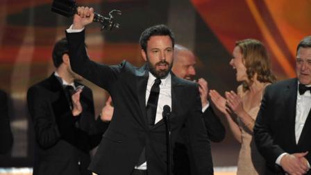 Ben Affleck, center, and the cast of argo accept the award for outstanding cast in a motion picture for Argo at the 19th Annual Screen Actors Guild Awards at the Shrine Auditorium in Los Angeles on Sunday Jan. 27, 2013. (Photo by John Shearer/Invision/AP)