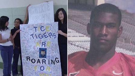Students created this huge card to cheer on Chykie Brown at the Super Bowl