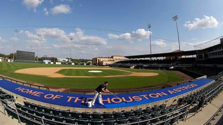Geo Rodriguez paints the top of a dugout at Osceola County Stadium, the Houston Astros spring training baseball facility, Monday, Feb. 11, 2013 in Viera, Fla. Astros pitchers and catchers first spring training workout is Tuesday. (AP Photo/David J. Phillip)