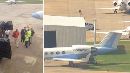 NBA legend Michael Jordan (in orange shirt, left) arrived in Houston Tuesday via his private jet for the 2013 NBA All-Star Game weekend.