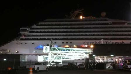 The crippled Triumph docked at the Port of Mobile in Alabama